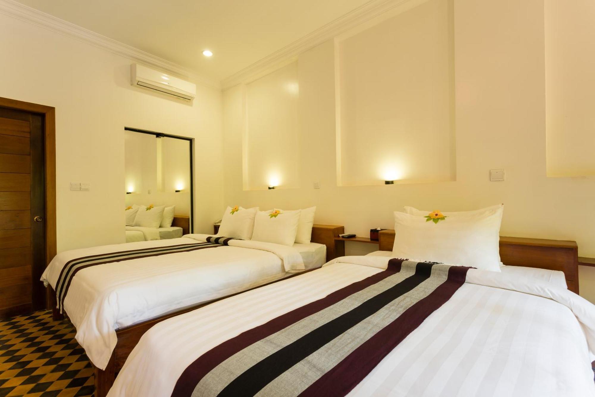 Le Jardin D'Angkor Hotel & Resort Siem Reap Quarto foto