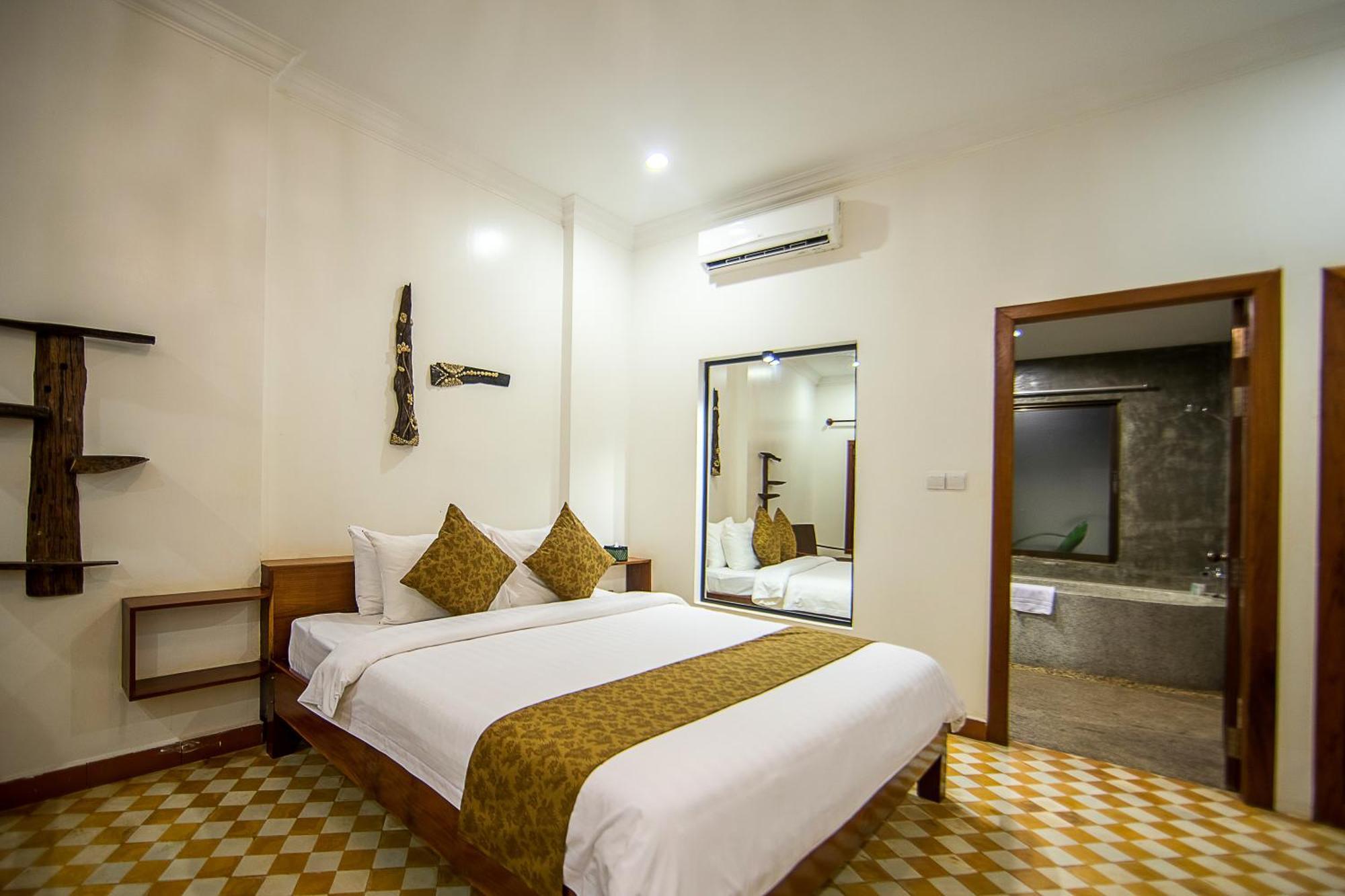 Le Jardin D'Angkor Hotel & Resort Siem Reap Quarto foto