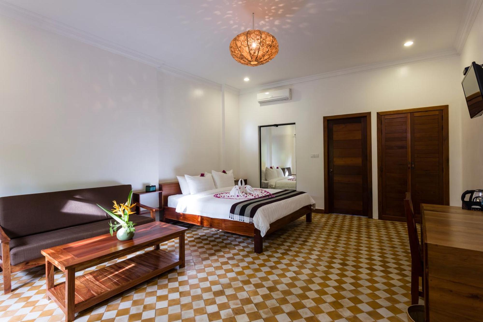 Le Jardin D'Angkor Hotel & Resort Siem Reap Quarto foto