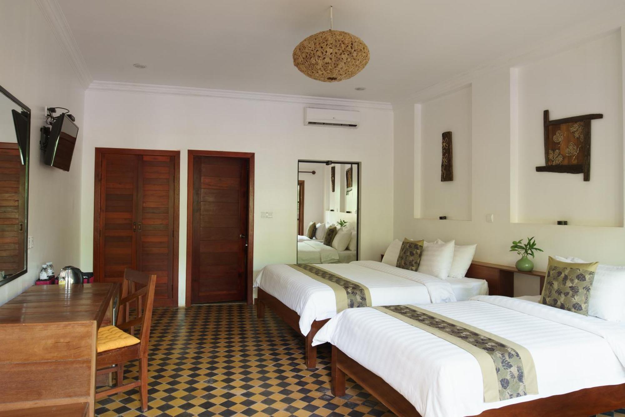 Le Jardin D'Angkor Hotel & Resort Siem Reap Quarto foto