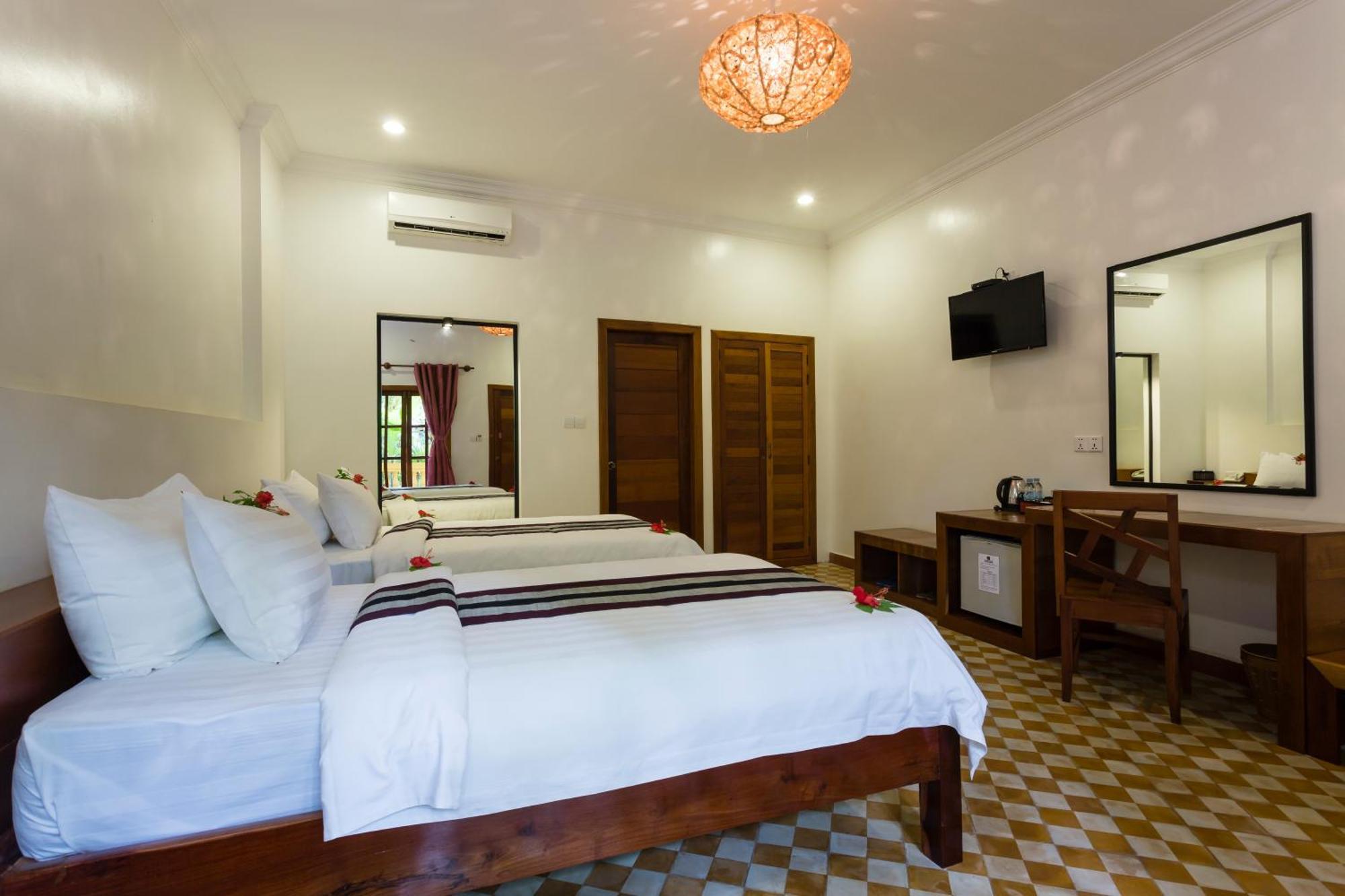 Le Jardin D'Angkor Hotel & Resort Siem Reap Quarto foto