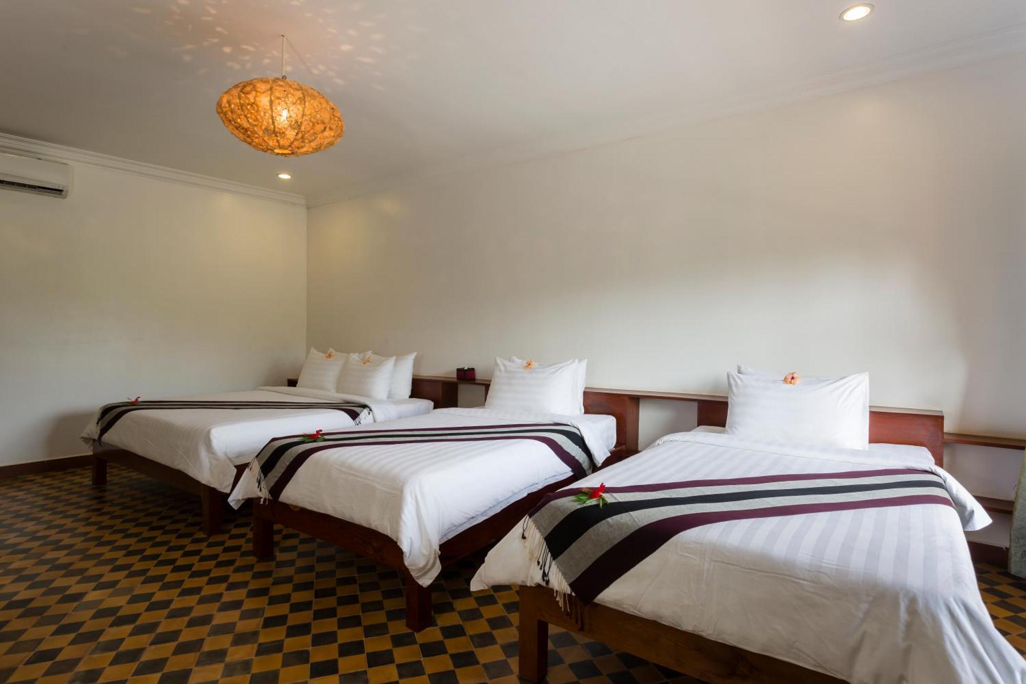 Le Jardin D'Angkor Hotel & Resort Siem Reap Quarto foto