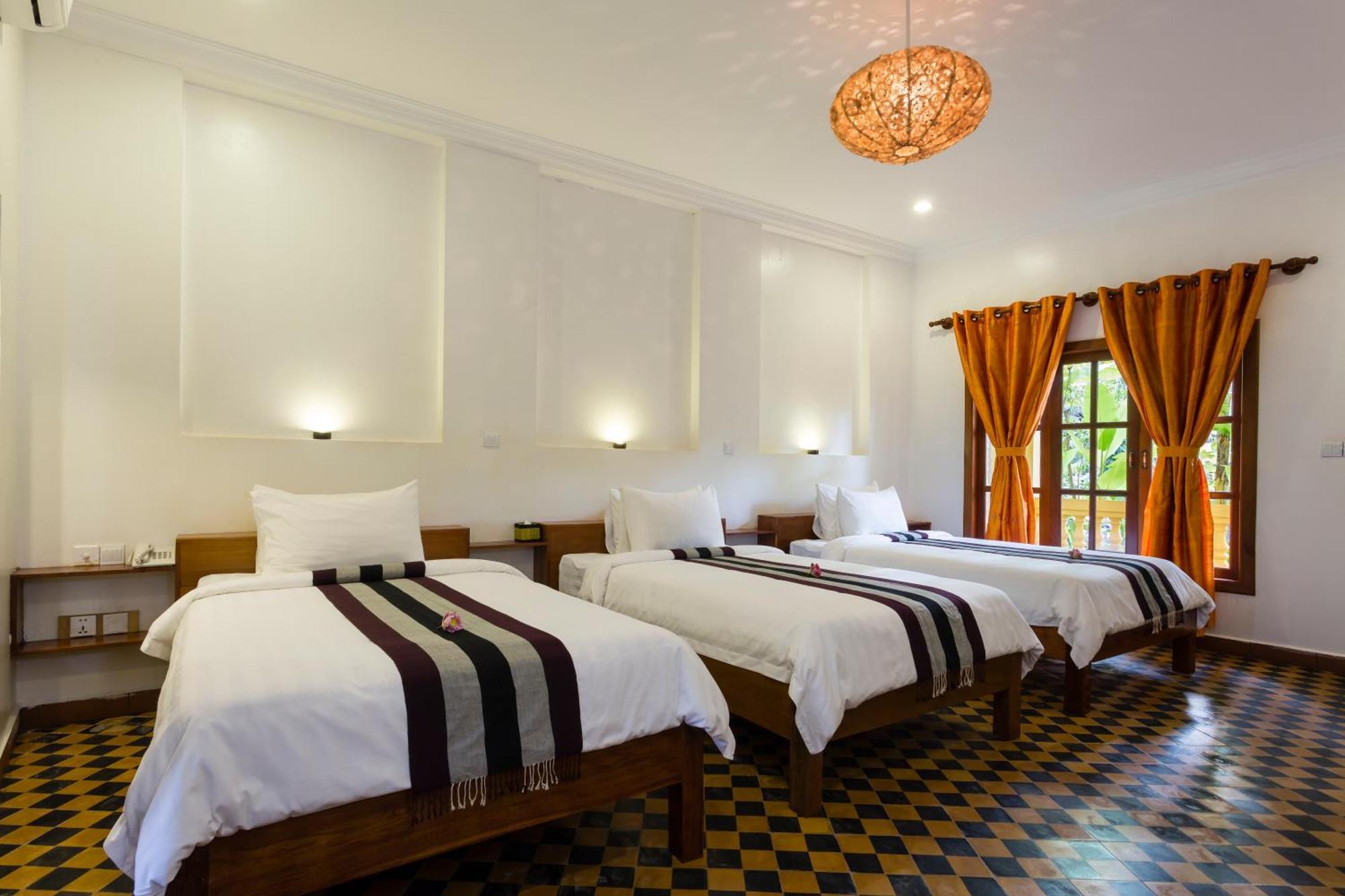 Le Jardin D'Angkor Hotel & Resort Siem Reap Quarto foto