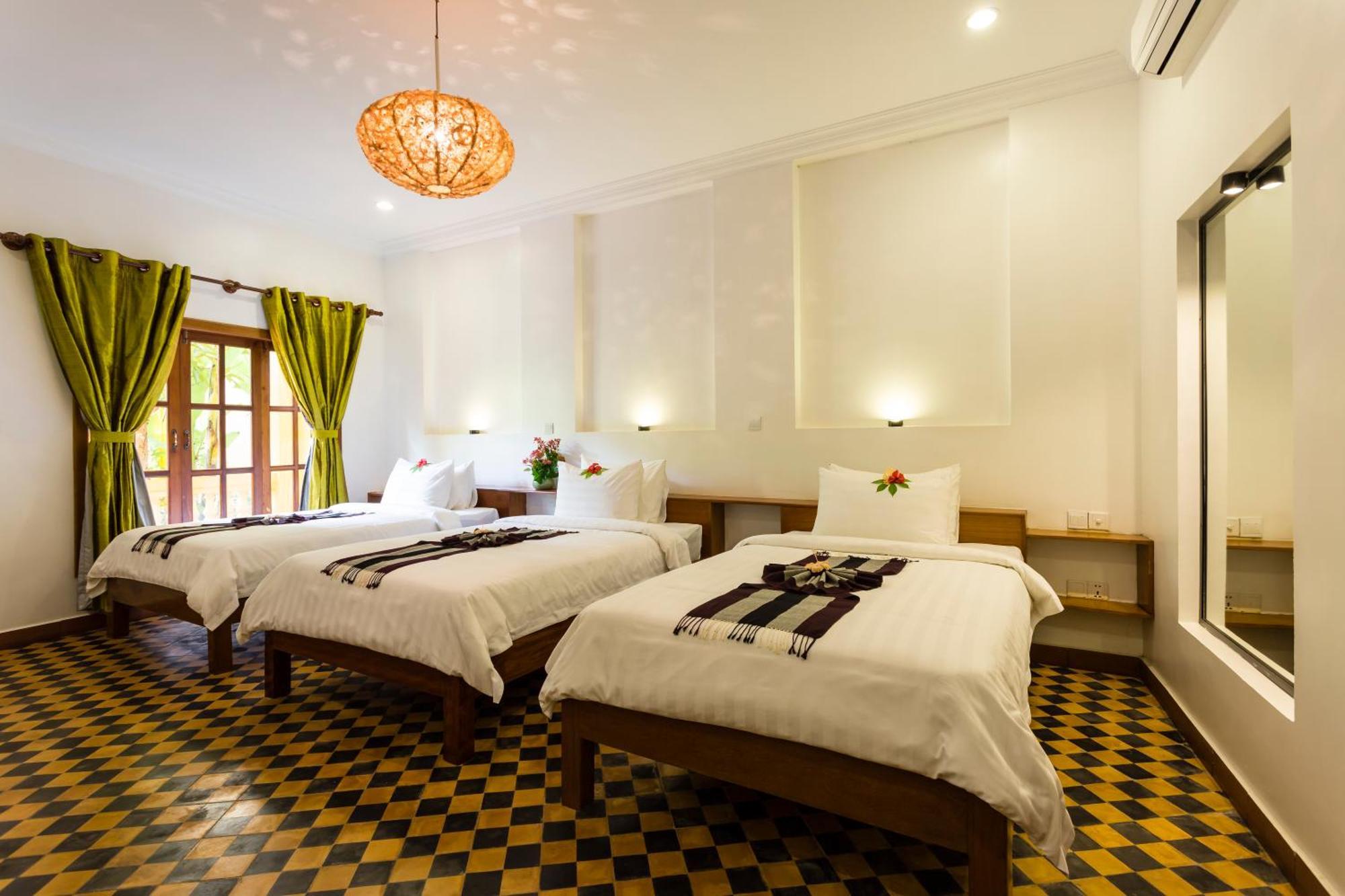 Le Jardin D'Angkor Hotel & Resort Siem Reap Quarto foto