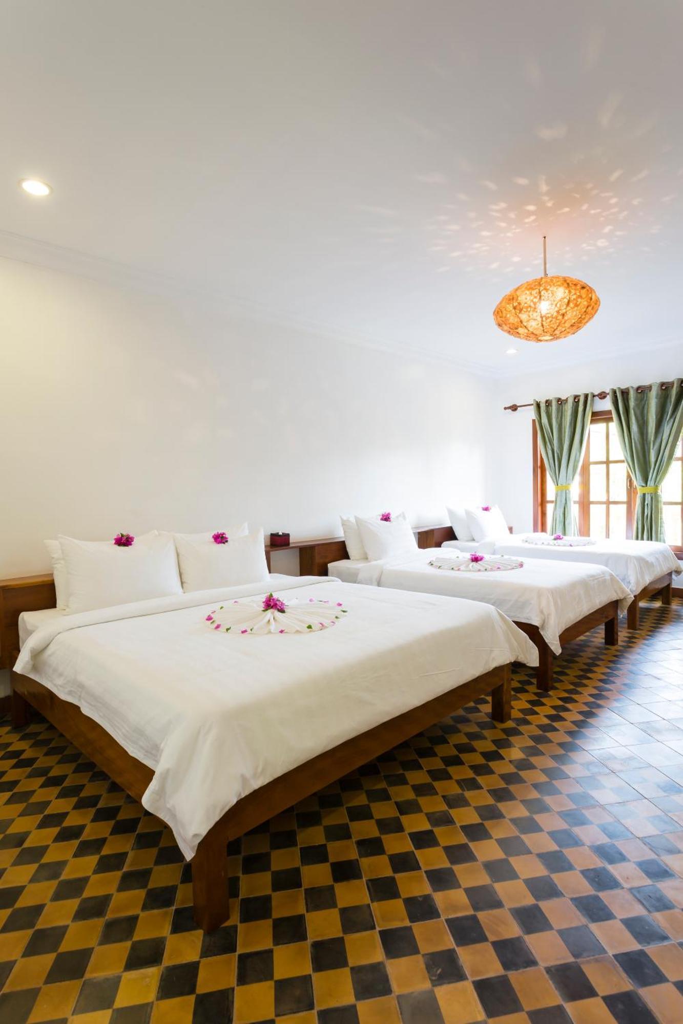 Le Jardin D'Angkor Hotel & Resort Siem Reap Quarto foto