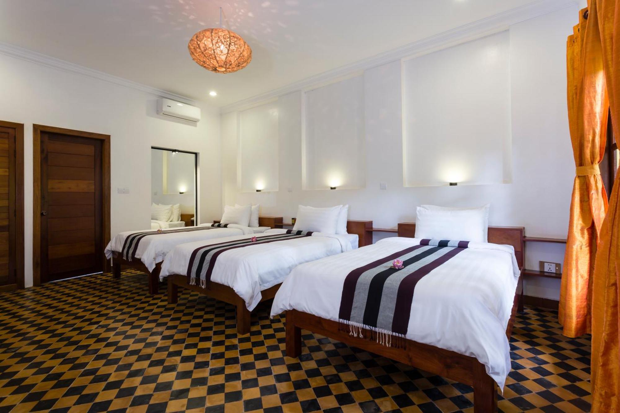 Le Jardin D'Angkor Hotel & Resort Siem Reap Quarto foto